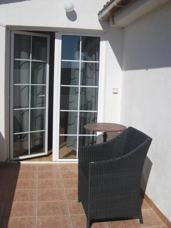 Guesthouse Sime Kolan Quarto foto